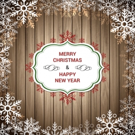 christmas greeting on wooden planks with snowflakestexture